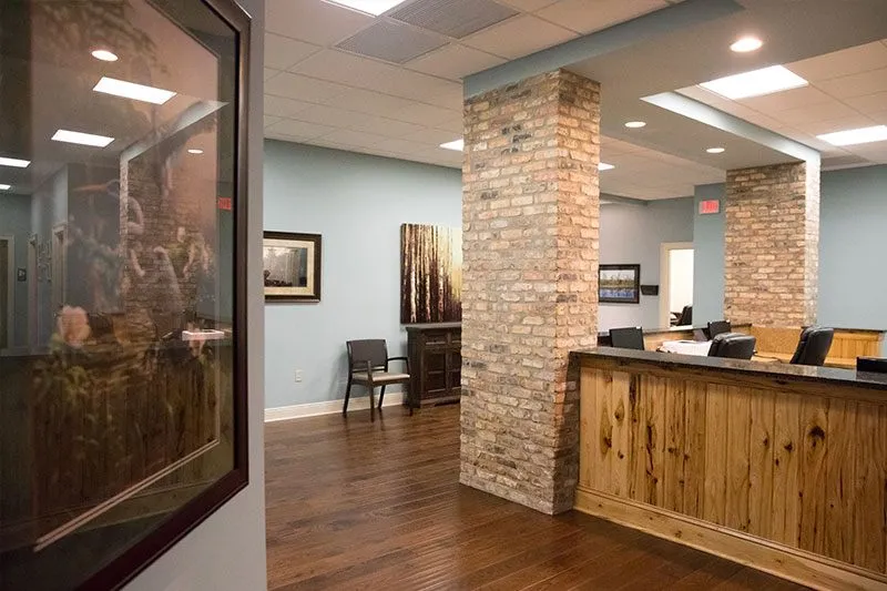 Front desk and waiting area at Louisiana Dental Center Denham Springs